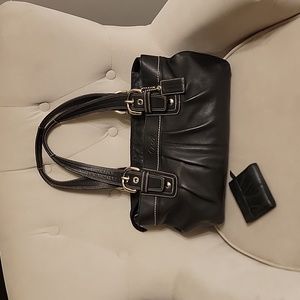 Black women's Coach purse with matching wallet